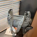 Light blue denim crossbody bag with matching round mini coin purse and wide strap - One Size / Light Blue