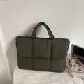 Deep green quilted laptop tote bag with padded texture for casual commuting use - Green
