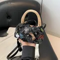 Black butterfly embroidery handbag with wooden handle and elegant fringe detail - Butterfly Embroidery Style (Butterfly Style)