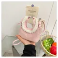 Pink suede dumpling bag with white faux fur handle and adjustable shoulder strap - One Size / Pink