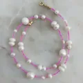Detail of pink glass beads and irregular freshwater pearls on a handmade gold clasp necklace - Short Choker Length / Pink