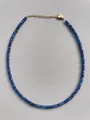 Detail of blue natural stone beaded necklace with 18k gold plated clasp and extender - Necklace / 38+5cm / Dark Blue