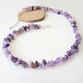 Detail of purple crushed stone necklace with silver lobster clasp on wooden background - Purple Stone Chips (Style A) / Steel