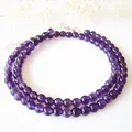 Detail van natuurlijke amethist choker met zilveren karabijnsluiting en verstelbare ketting - Paars (Stijl A) / Staalkleur