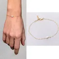 Minimalist 18k gold plated bracelet featuring a natural freshwater pearl and lobster clasp - Bracelet - Style 4