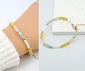 Pulsera de cuentas de piedra natural con cilindros en tonos pastel y bolas doradas - Pulsera de mezcla de cuatro colores