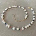 Detail of bohemian pearl necklace with colorful beads and golden lobster clasp - Short Choker Length / Red Yellow Blue Green