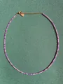 Macro-opname van de Boheemse kralenketting met paarse stenen en gouden hartje - Eén maat / Paars-Roze Stijl (4 Halskettingen)
