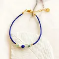 Detail of natural stone beaded bracelet with blue lapis lazuli and gold lobster clasp - Dark Blue Fine Tubular Beaded Style with Brand Tag (Bracelet 16) / 17+3cm