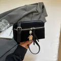 Elegant black velvet square crossbody bag featuring a unique silver robot metal pendant - Black