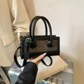 Mini leopard print crossbody bag in black shiny leather with leopard pattern panel - Leopard Print Black