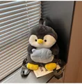 Cute gray and white plush penguin backpack with a small blue fish accessory - With Fish Pendant / Large