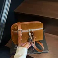 Brown suede crossbody square bag with a cute silver robot charm accessory - Brown