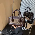 Chic leopard print and brown leather crossbody bag with dual handles and mirror detail - Leopard Brown