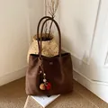 Dark brown suede tote bag with COIH 2DN logo and colorful bohemian charm pendant - With Pendant / Coffee