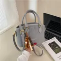 Grey matte leather handbag with wooden bead charm and crossbody strap for women - With Pendant / Gray Leopard Style
