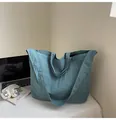Large capacity canvas tote bag in blue-green finish with dual handles and long strap - Blue
