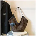 Detail of leopard print hobo tote bag with branding and small accessory pouch - With Pendant / Coffee