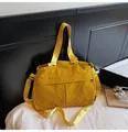 Lightweight bright yellow nylon tote bag with shoulder strap for daily commuting - Yellow