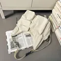 Off-white multi-pocket crossbody shoulder bag in durable nylon with adjustable strap - Off White