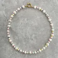 Detailed close-up of baroque pearls and vibrant multi-color beads with a gold clasp - 43cm Clavicle Chain / Red Yellow Blue Gradient
