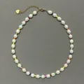 Detail of colorful beads and baroque pearls necklace with golden heart pendant - Short Choker Length / Rainbow