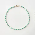 Detail of freshwater pearl necklace with turquoise beads and gold lobster clasp - Short Choker Length / Turquoise Green