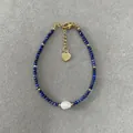 Detail of blue faceted stones bracelet with baroque pearl and golden heart charm - Dark Blue Faceted Beads with Large Artificial Pearl (Bracelet 10) / 17+3cm
