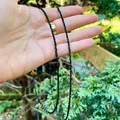 Detailed shot of ultra-fine black faceted beads necklace with gold heart clasp - Black Faceted Spinel/Agate (G) / 38cm+5cm