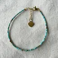 Handmade beaded bracelet with turquoise stones, gold spacers and a heart pendant - Turquoise Colored Simple Style (Bracelet 21)