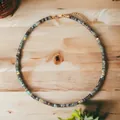 Colorful natural semi-precious stone beaded necklace with golden cylindrical spacers - Ink Blue Spacers