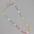Regenboog kralenketting met zoetwaterparels, kleurrijke sterren en gouden sluiting - Kralen Schelp Ster Ketting / 38+5cm / Kleurrijk