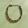 Bracelet en pierres naturelles colorées avec cubes de cristal rouges et breloque cœur - Style de cristal facetté rouge et pierre ovale verte / Taille unique / 17+3cm / Rouge & Vert