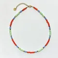 Detail of handmade beaded necklace with colorful stones, gold heart charm, and lobster clasp - Necklace 8 (38+5cm)
