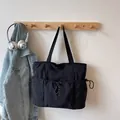 Große schwarze Nylon-Umhängetasche mit mehreren Kordelzugtaschen für den täglichen Weg - Einheitsgröße / Schwarz