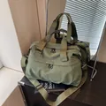 Olive green nylon travel bag with large capacity, dual handles and adjustable shoulder strap - One Size / Green