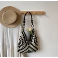 Handwoven black and white geometric tote bag with rustic wooden bead handles - Patterned Black