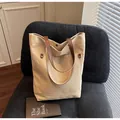 Borsa tote minimalista in tela beige con manici in pelle marrone e tasca esterna - Taglia unica / Cachi