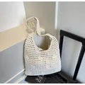 Borsa a tracolla minimalista all'uncinetto bianco crema con maglia larga e tracolla larga - Taglia unica / Bianco Sporco