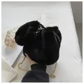 Chic black faux fur handbag with a premium gold chain strap for winter style - One Size / Black