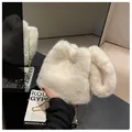 Chic cream faux fur handbag with rabbit ear design and gold chain shoulder strap - One Size / Off White