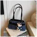 Blue denim underarm bag with black leather straps and a cute teddy bear charm - With Pendant / Blue/Black