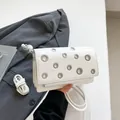 Retro white faux leather crossbody bag with metal eyelets and adjustable strap - One Size / White