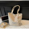 Beige canvas tote bag with blue embroidery and cute brown teddy bear keychain pendant - With Pendant / Off White