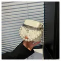 Elegant cream white pleated crossbody bag with pearl handle and rhinestone details - Off White