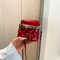 Elegant red quilted mini crossbody bag with pearl handle and shiny crystal studs - Red
