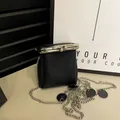 Mini black lychee pattern leather lipstick bag with silver metal chain and clasp - One Size / Black