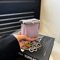 Chic purple mini lipstick bag with litchi grain texture and silver chain strap - One Size / Purple