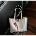 Silver woven tote bag with a red heart charm and large capacity for women's fashion - With Pendant / Silver
