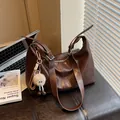 Dark brown large capacity hobo bag with glossy finish and white plush doll charm - With Pendant / Coffee